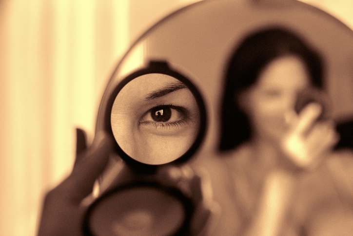 looking-into-hand-mirror.jpg